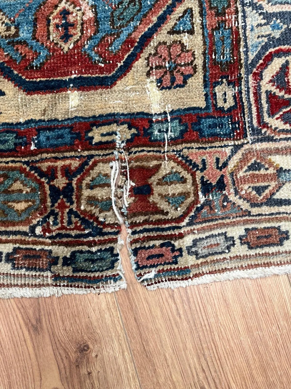 Persian rug before repair