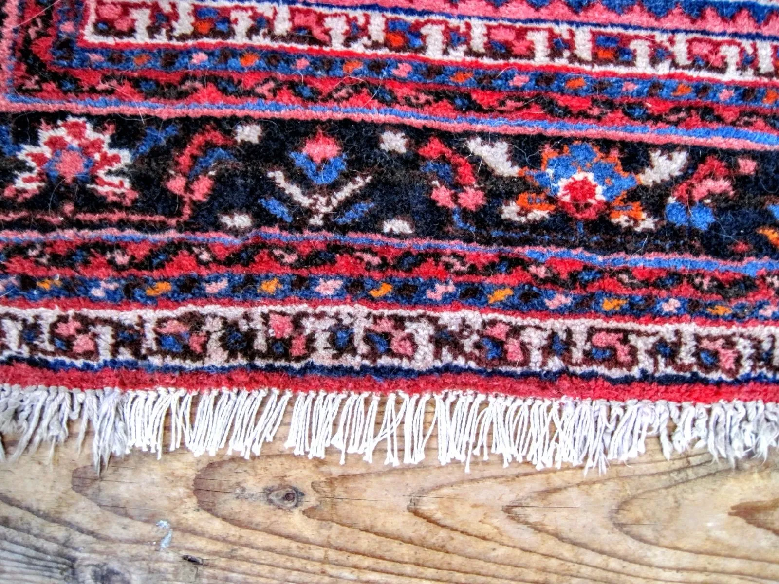 Persian rug after fringe repair
