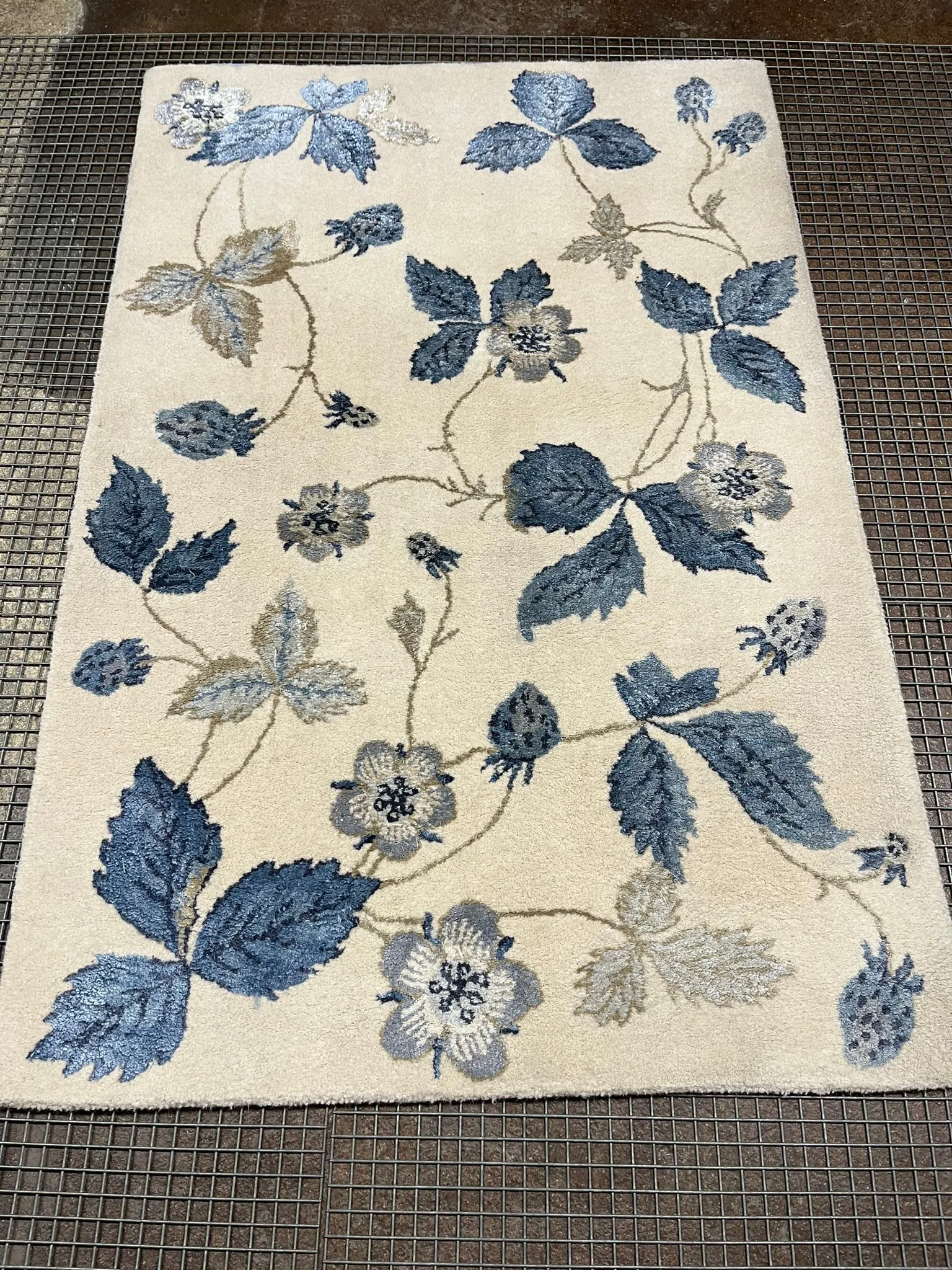 Machine-made viscose rug before deep cleaning